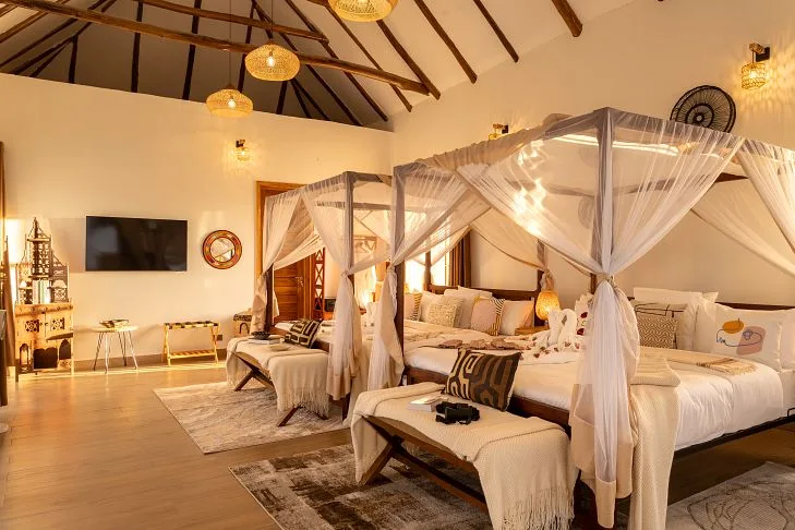 Open-air safari lodge lounge at dusk